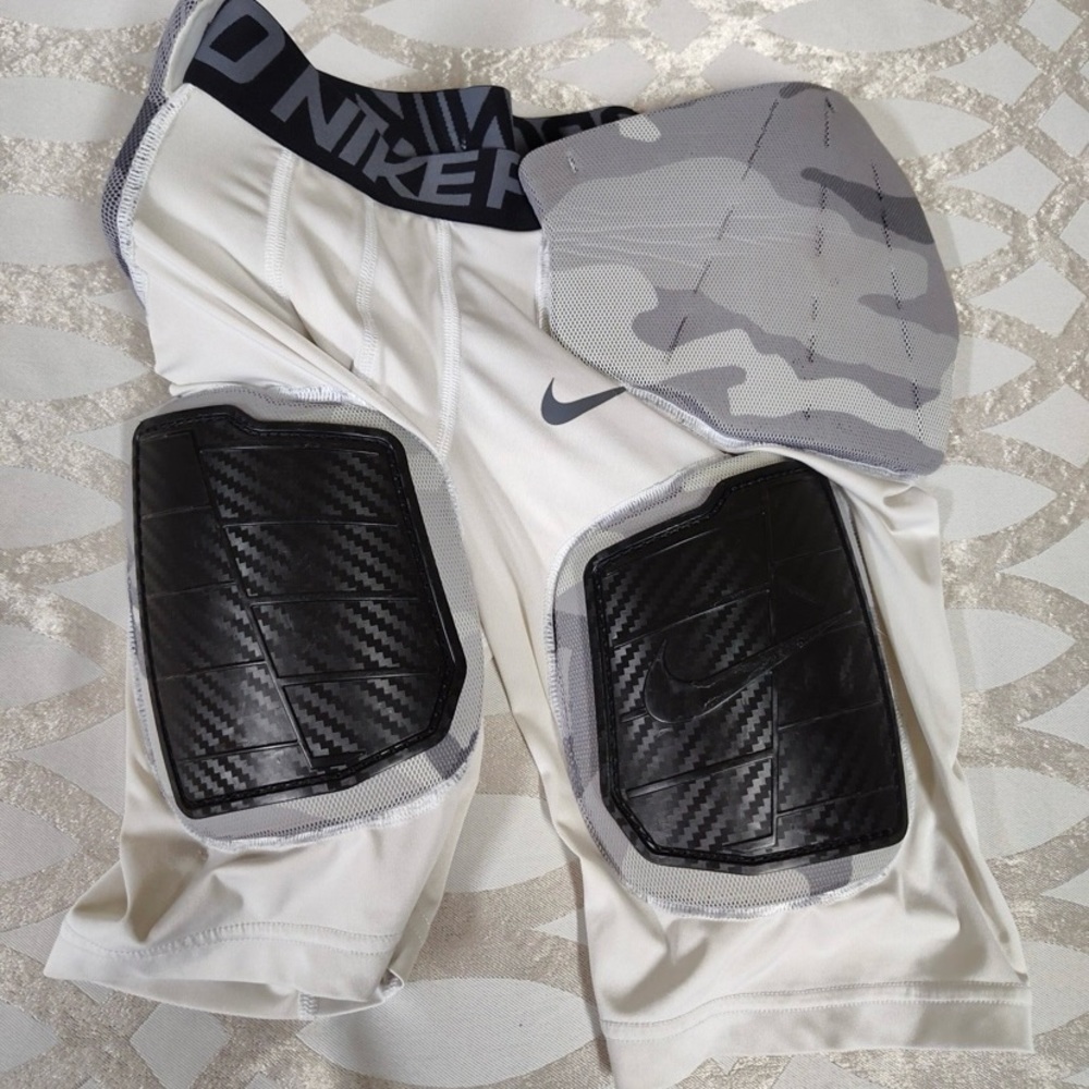 Boys large Nike hyperstrong protective football leg pads